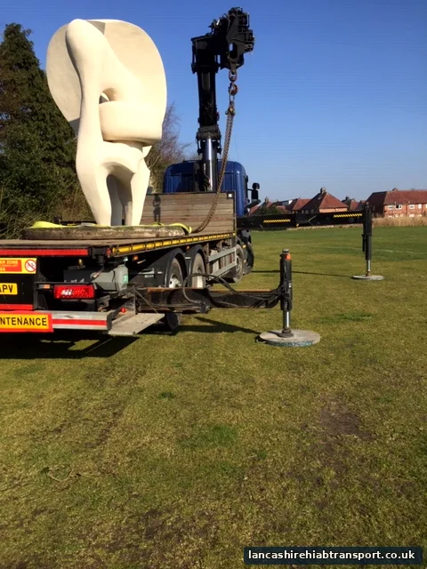 Hiab lorry relocating a sculpture in Southport
