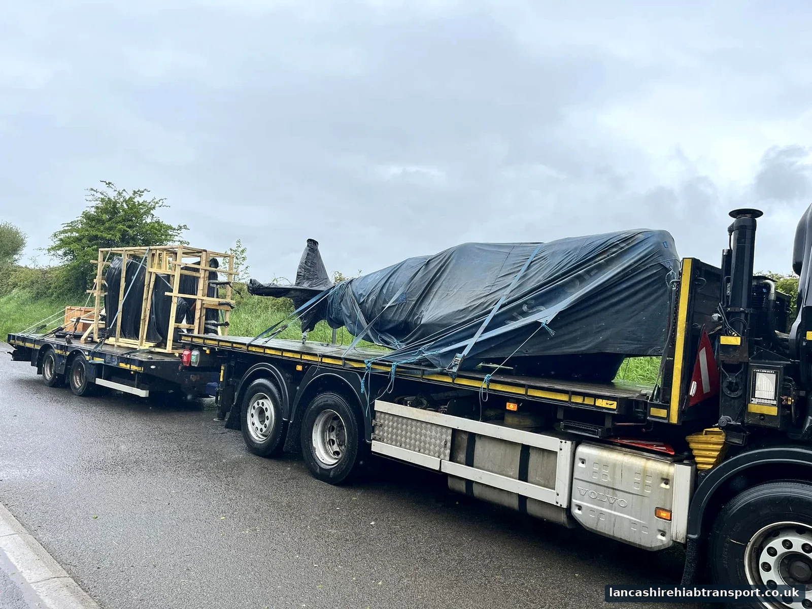 Machinery transported on a Hiab crane lorry in Lancashire