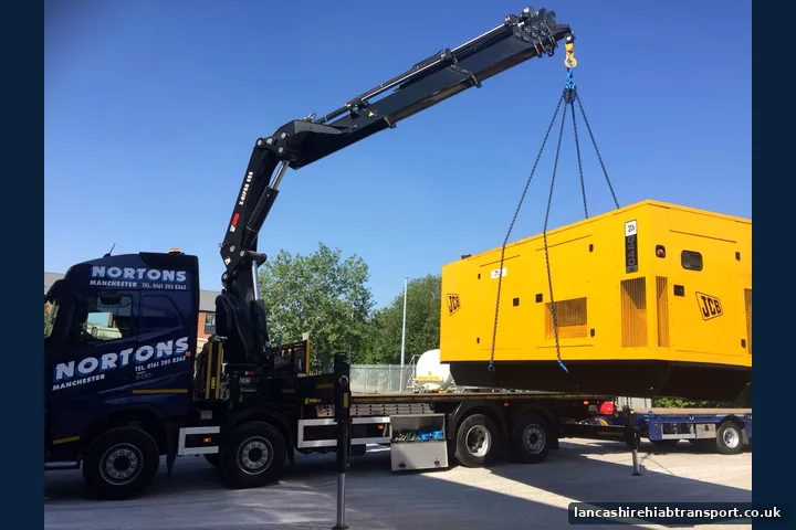 Hiab lorry lifting and transporting large plant equipment